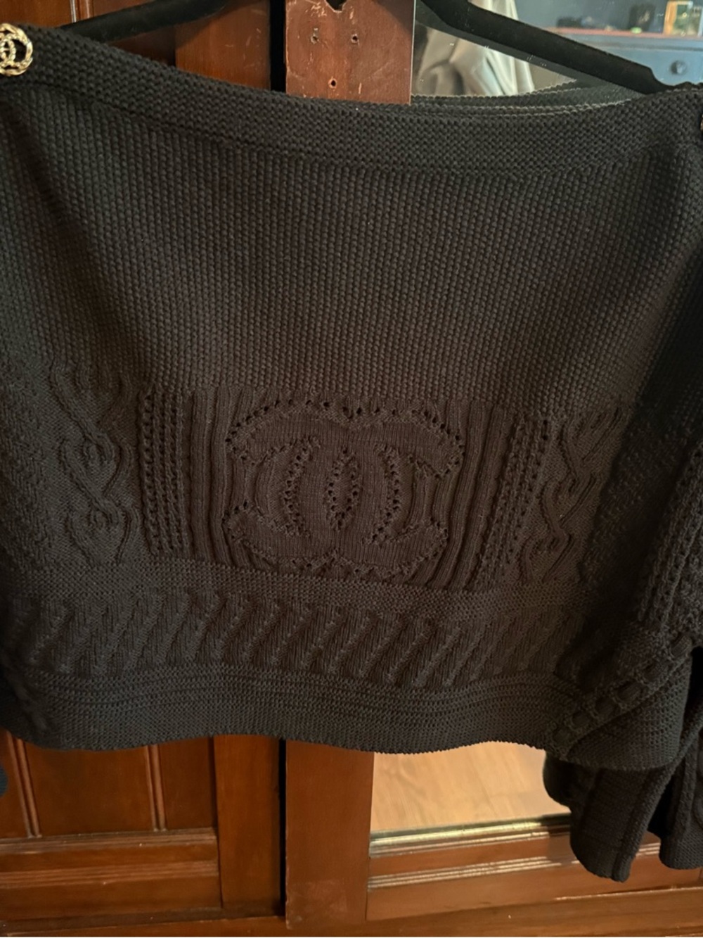 CHANEL Black Off-the-Shoulder Cable Knit Sweater with Logo